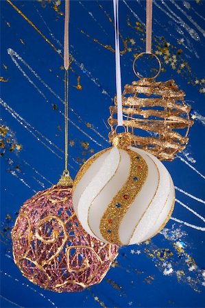 simsearch:614-02241057,k - Festive Christmas hanging balls composition on blue decorative winter background with sparkles and stars Stock Photo - Budget Royalty-Free & Subscription, Code: 400-03969983