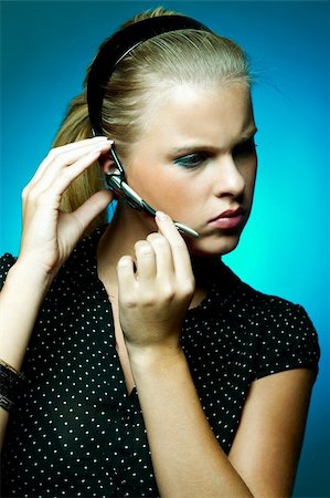 simsearch:400-03933798,k - Beautiful Customer Support Business Woman With Wireless Headset Stock Photo - Budget Royalty-Free & Subscription, Code: 400-03960124