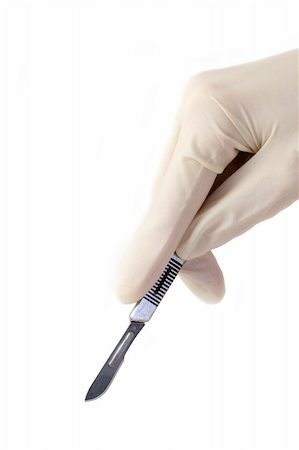 simsearch:846-05646308,k - Scalpel in a hand with rubber glove Photographie de stock - Aubaine LD & Abonnement, Code: 400-03960448