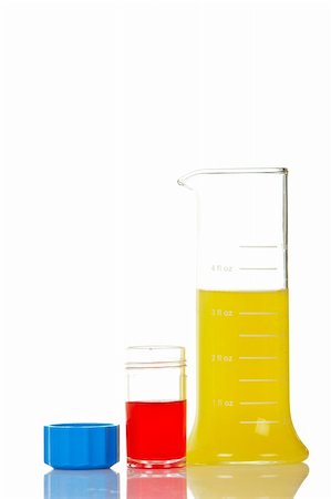 simsearch:649-07279795,k - A test flasks with blue and red liquid, reflected on white background Stock Photo - Budget Royalty-Free & Subscription, Code: 400-03960449