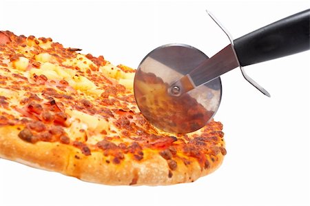 simsearch:400-04479187,k - Tasty Italian pizza and cutter, isolated on white background. Shallow DOF Stock Photo - Budget Royalty-Free & Subscription, Code: 400-03960469