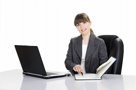 simsearch:400-04416781,k - Beautiful business woman working with a laptop on a white background Photographie de stock - Aubaine LD & Abonnement, Code: 400-03960898