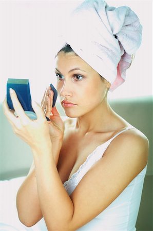 simsearch:400-04366344,k - Pretty woman applying make up with white towel on her head Stock Photo - Budget Royalty-Free & Subscription, Code: 400-03961537