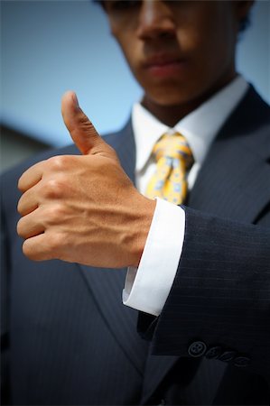 simsearch:400-04790442,k - Business man dressed in suit showing a thumbs up. Concept: Good job, well done. Stock Photo - Budget Royalty-Free & Subscription, Code: 400-03961993