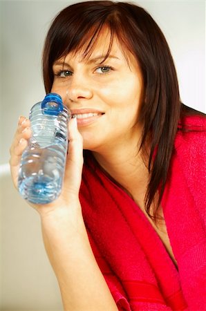 simsearch:400-03976636,k - Brunette young woman with bottle of water and red towel. After fitness Stock Photo - Budget Royalty-Free & Subscription, Code: 400-03962750