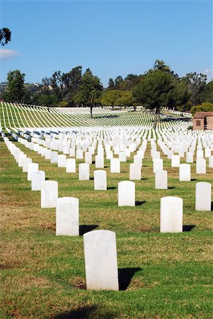 simsearch:862-06676770,k - Tombstones lined up in the Los Angeles National Cemetery. The VA National Cemetery Administration honors the military service of our Nation's veterans. Stock Photo - Budget Royalty-Free & Subscription, Code: 400-03962958