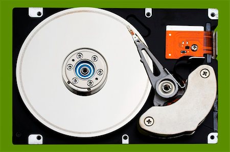 simsearch:400-05252692,k - Open hard disk drive, in a green background Stock Photo - Budget Royalty-Free & Subscription, Code: 400-03975663