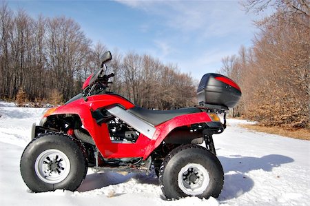 red quad bike in snow mountain scenery Stock Photo - Budget Royalty-Free & Subscription, Code: 400-03976987