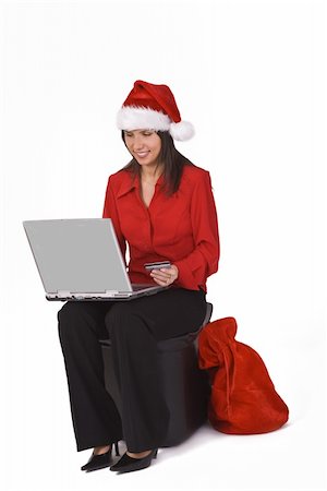 simsearch:400-04410667,k - Santa's secretary is shopping online for Christmas gifts.Shot with Canon 70-200mm f/2.8L IS USM Stock Photo - Budget Royalty-Free & Subscription, Code: 400-03977875