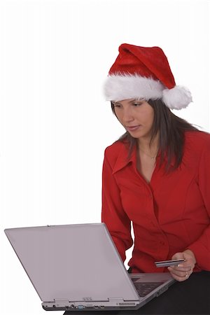 simsearch:400-04410667,k - Santa 's secretary is shopping online for Christmas gifts. Shot with Canon 70-200mm f/2.8L IS USM Stock Photo - Budget Royalty-Free & Subscription, Code: 400-03977873