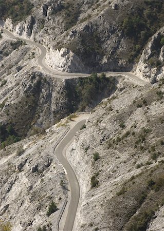 ramps on the road - Road on the mountain Foto de stock - Super Valor sin royalties y Suscripción, Código: 400-03978075