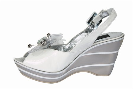 simsearch:400-06070695,k - White shoes with an ornament on a white background Foto de stock - Super Valor sin royalties y Suscripción, Código: 400-03978584