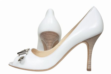 simsearch:400-06070695,k - Celebratory female white shoes on a white background Foto de stock - Super Valor sin royalties y Suscripción, Código: 400-03979459