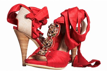 simsearch:400-07218273,k - Female red shoes with tapes on a white background Stock Photo - Budget Royalty-Free & Subscription, Code: 400-03979461