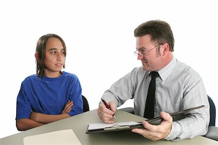 A teacher confronting a rebellious teen with his bad grades. Stock Photo - Budget Royalty-Free & Subscription, Code: 400-03970427