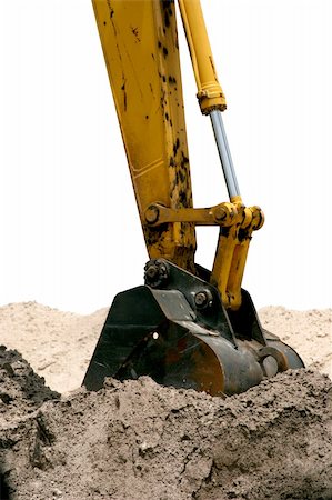 simsearch:700-05662628,k - A back hoe digging in the dirt with a white background. Stock Photo - Budget Royalty-Free & Subscription, Code: 400-03971015