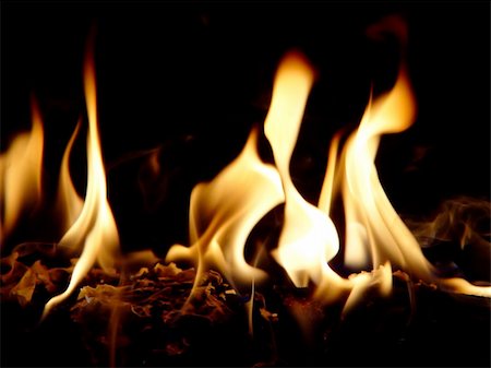simsearch:614-03763965,k - A closeup of a flaming log against a black background. Stock Photo - Budget Royalty-Free & Subscription, Code: 400-03971021