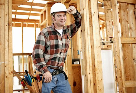 simsearch:700-02071118,k - A construction worker with his tools on the jobsite.  Authentic construction worker on actual construction site. Stock Photo - Budget Royalty-Free & Subscription, Code: 400-03971112