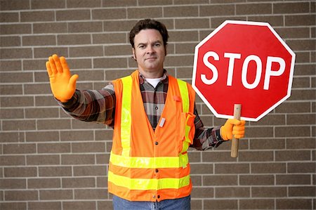 public safety sign - A friendly school crossing guard holding a stop sign. Stock Photo - Budget Royalty-Free & Subscription, Code: 400-03971148