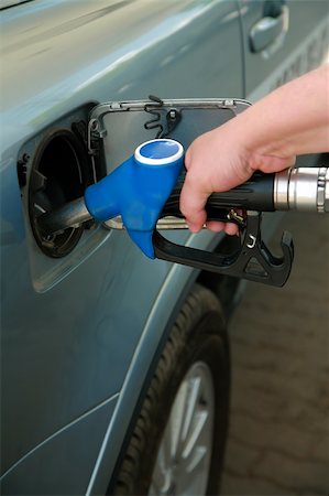 simsearch:6105-05395912,k - Refuelling by gasoline of the modern car Stock Photo - Budget Royalty-Free & Subscription, Code: 400-03971830