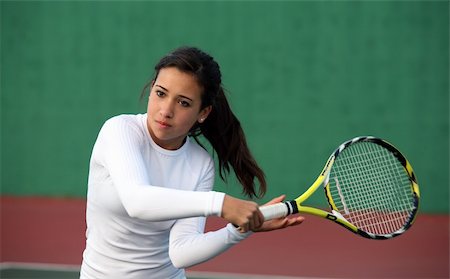 simsearch:640-06050635,k - Teenage girl playing tennis Stock Photo - Budget Royalty-Free & Subscription, Code: 400-03971986