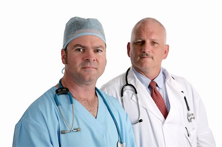 simsearch:649-07064718,k - Two handsome, competent looking doctors isolated on a white background. Stock Photo - Budget Royalty-Free & Subscription, Code: 400-03972383
