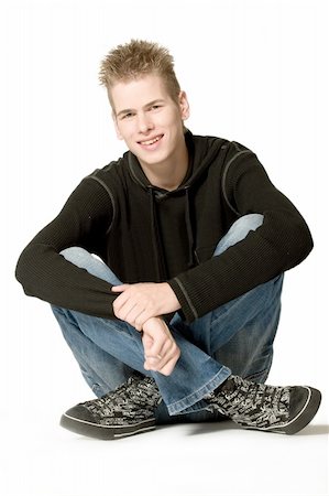 simsearch:400-04332775,k - studio portrait of a young man smiling Stock Photo - Budget Royalty-Free & Subscription, Code: 400-03973421