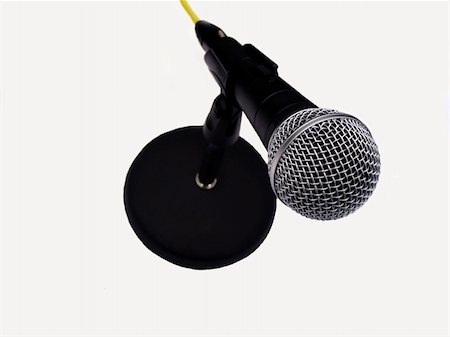 simsearch:400-06954069,k - This is a picture of a microphone on a table stand isolated on a white background. Photographie de stock - Aubaine LD & Abonnement, Code: 400-03994489