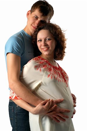 simsearch:400-04866555,k - young father hugging his pregnant wife, isolated on white Foto de stock - Super Valor sin royalties y Suscripción, Código: 400-03994552
