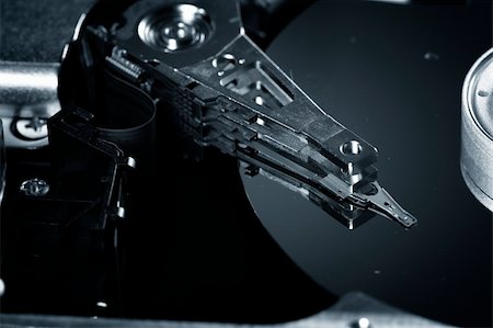 simsearch:400-05238336,k - Macro photo - Hard Disk Drive. Great details ! Stock Photo - Budget Royalty-Free & Subscription, Code: 400-03995011