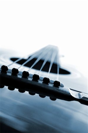picture of the blue playing a instruments - Acoustic guitar close up on white background Stock Photo - Budget Royalty-Free & Subscription, Code: 400-03996561