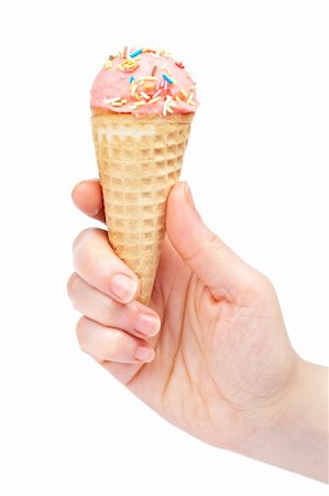 simsearch:400-05718903,k - Holding delicious strawberry ice cream cone isolated on white background Stock Photo - Budget Royalty-Free & Subscription, Code: 400-03999103