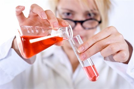 simsearch:649-07279795,k - Chemist woman working on a biochemical experiment Stock Photo - Budget Royalty-Free & Subscription, Code: 400-03992025
