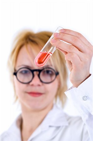 simsearch:649-07279795,k - Scientist woman analyzing chemical material in test tube Stock Photo - Budget Royalty-Free & Subscription, Code: 400-03992026