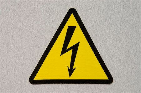 high voltage sign on white metal plate Stock Photo - Budget Royalty-Free & Subscription, Code: 400-03993174