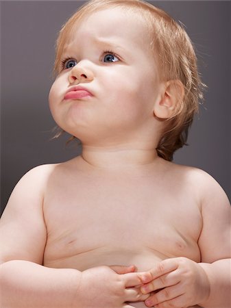 schmollen (beleidigt sein) - Porträt von Baby Girl Stockbilder - Premium RF Lizenzfrei, Bildnummer: 600-04424901
