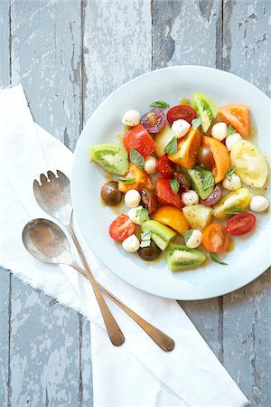 Heirloom Tomato Salad Stock Photo - Premium Royalty-Free, Code: 600-04625533