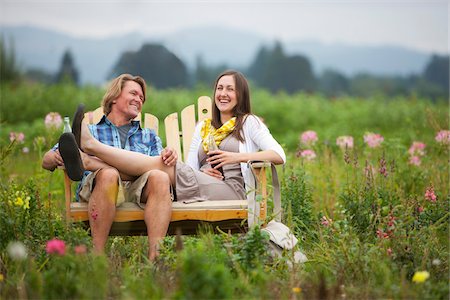 simsearch:700-03503010,k - Couple on Bench in Field, Portland, Oregon, USA Stock Photo - Premium Royalty-Free, Code: 600-04931701