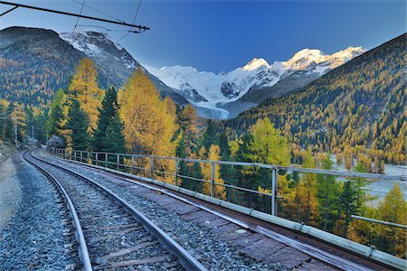 subalpine larch - Railroad Tracks Through Mountains, Morteratsch Glacier, Bernina Pass, Pontresina, Canton of Graubunden, Switzerland Stock Photo - Premium Royalty-Free, Code: 600-05524278