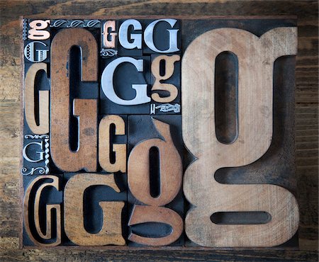 fonts - Letterpress G's Stock Photo - Premium Royalty-Free, Code: 600-05524414