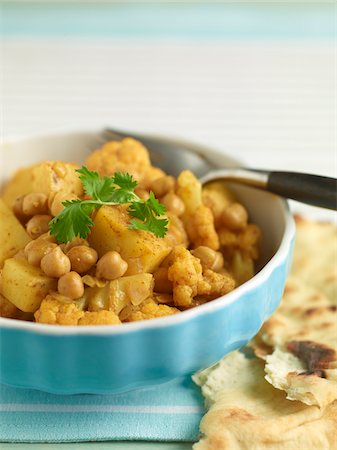 simsearch:600-06892689,k - Chickpea Curry with Naan Stock Photo - Premium Royalty-Free, Code: 600-05560302
