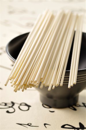 simsearch:600-05973291,k - Uncooked Udon Noodles and Bowl Stock Photo - Premium Royalty-Free, Code: 600-05973319