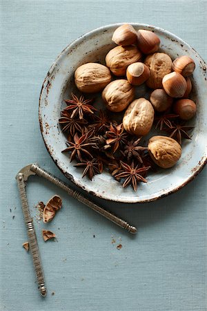 spices - Walnuts and Hazelnuts with Star Anise and Nutcracker Stock Photo - Premium Royalty-Free, Code: 600-05973616