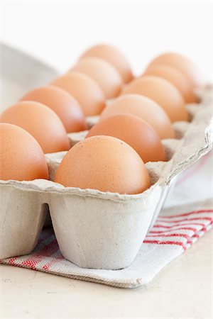 eggs white background - Brown Eggs in Carton Stock Photo - Premium Royalty-Free, Code: 600-06009278