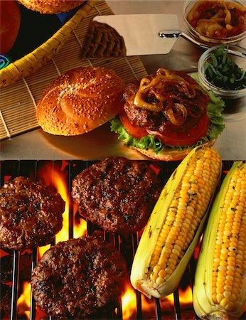 Hamburger Patties and Corn on Barbeque Grill Stock Photo - Premium Royalty-Free, Code: 600-06125778