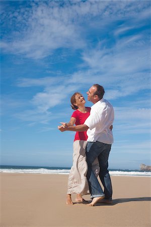 frolicking - Couple Dancing on the Beach, Camaret-sur-Mer, Crozon Peninsula, Finistere, Brittany, France Stock Photo - Premium Royalty-Free, Code: 600-06382819