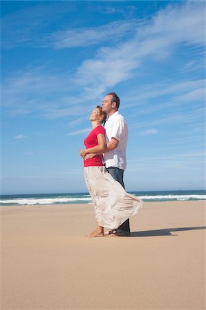 simsearch:600-05389204,k - Mature Couple Hugging on the Beach, Camaret-sur-Mer, Crozon Peninsula, Finistere, Brittany, France Stock Photo - Premium Royalty-Free, Code: 600-06382821