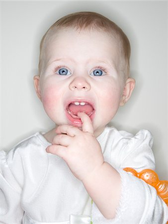 finger in mouth - Portrait of Baby Girl Stock Photo - Premium Royalty-Free, Code: 600-06397689