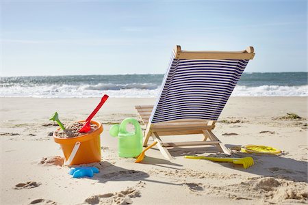 relaxing on beach - Beach Toys and Beach Chair, Cap Ferret, Gironde, Aquitaine, France Stock Photo - Premium Royalty-Free, Code: 600-06407681