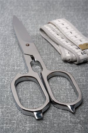 Close-up of Scissors and Measuring Tape Stock Photo - Premium Royalty-Free, Code: 600-06438863